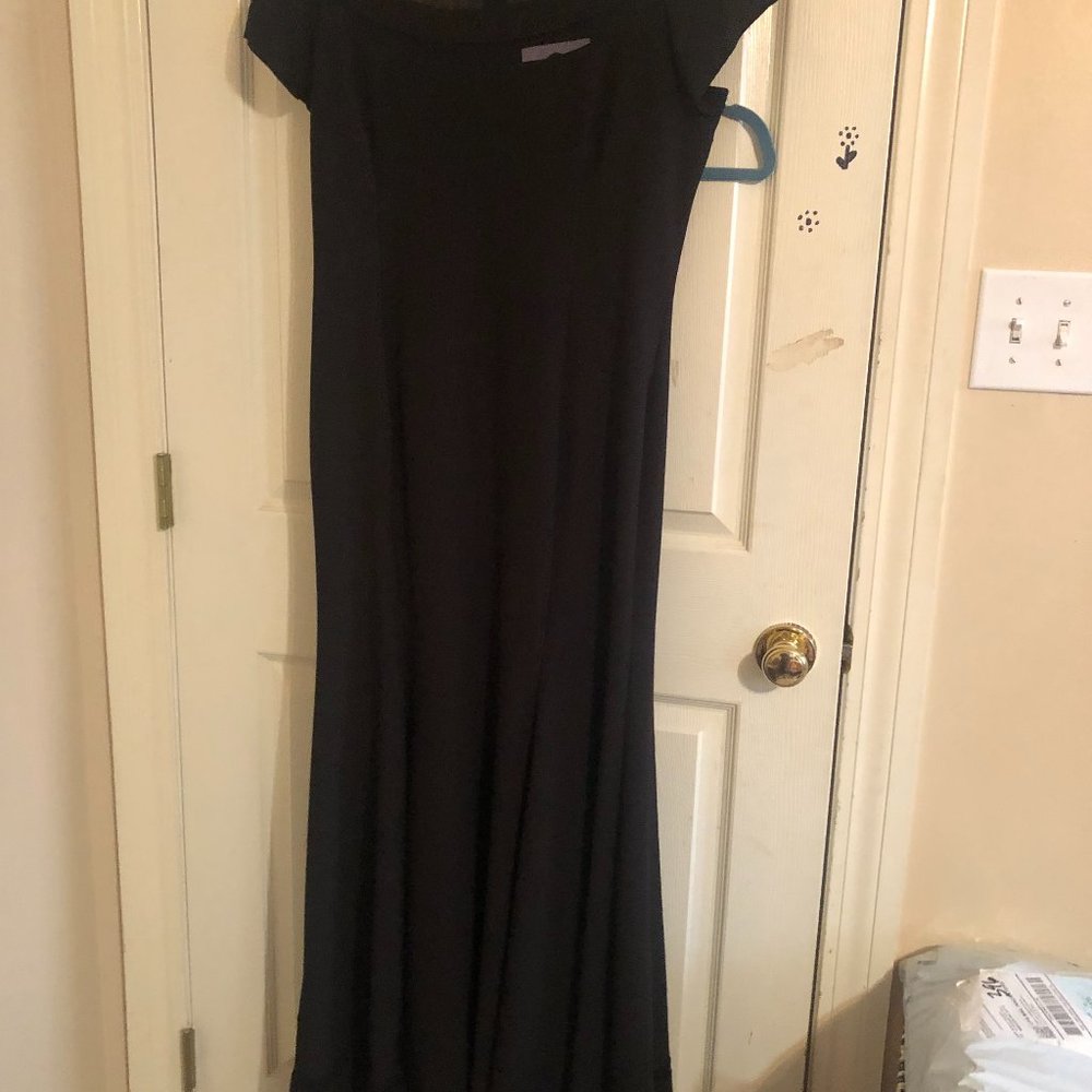 JS Collections black formal ball gown size 14 with sheer panel on neckline,hem.